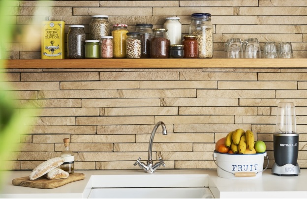 Assorted Kitchen Ingredients In Jars On A Kitchen Shelf